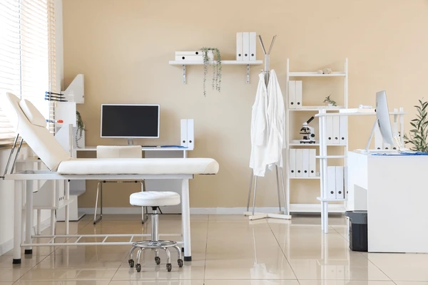 Modern clinic interior design with a light, doctor-friendly ambience, by Nail and Hammer, a clinic interior designer in Gurugram